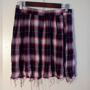 Pink distressed plaid skirt